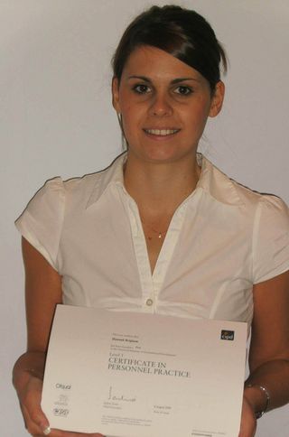 Hannah Brigham with her certificate in personnel practice